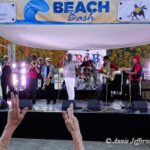 Band performing at outdoor Beach Bash event.